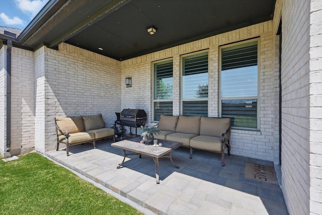 view of patio / terrace featuring an outdoor hangout area and area for grilling