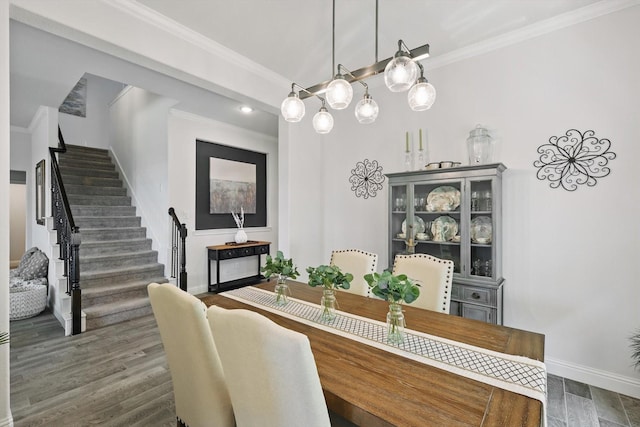 dining room with stairs, wood finished floors, baseboards, ornamental molding, and recessed lighting