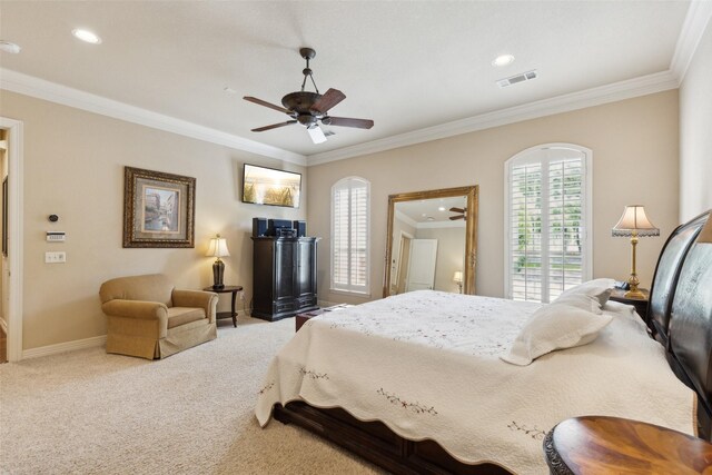 carpeted bedroom featuring visible vents, crown molding, baseboards, ceiling fan, and recessed lighting