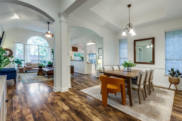 5000 Stonecrest Dr, Mckinney, TX 75071 - dining area with dark wood finished floors, arched walkways, and crown molding