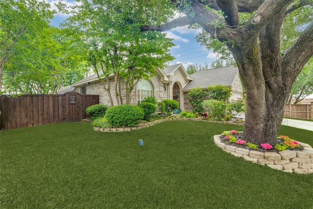 5000 Stonecrest Dr, Mckinney, TX 75071 - obstructed view of property featuring a gate, roof with shingles, and stone siding
