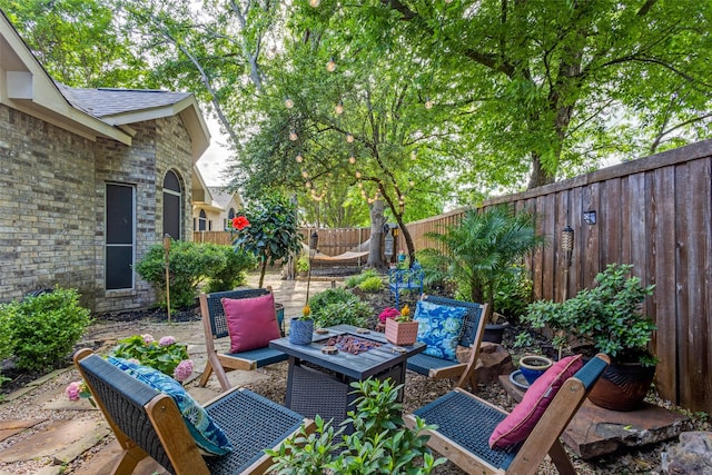 5000 Stonecrest Dr, Mckinney, TX 75071 - view of patio / terrace featuring a fenced backyard and an outdoor fire pit