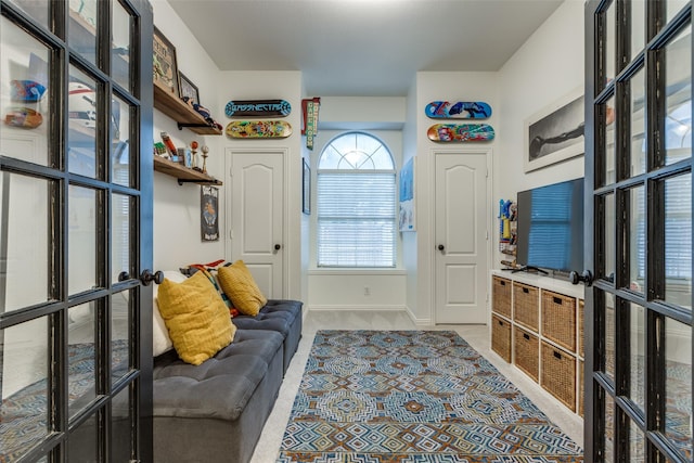 5000 Stonecrest Dr, Mckinney, TX 75071 - mudroom with light colored carpet, french doors, and baseboards