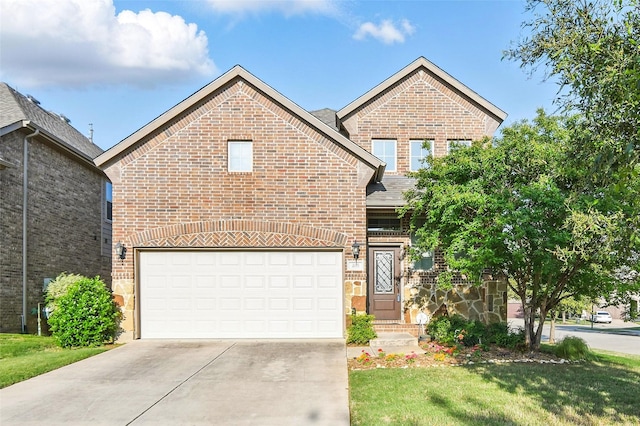 400 Sterling Rdg, Lantana, TX 76226 - view of front facade with a front lawn, driveway, brick siding, and a garage