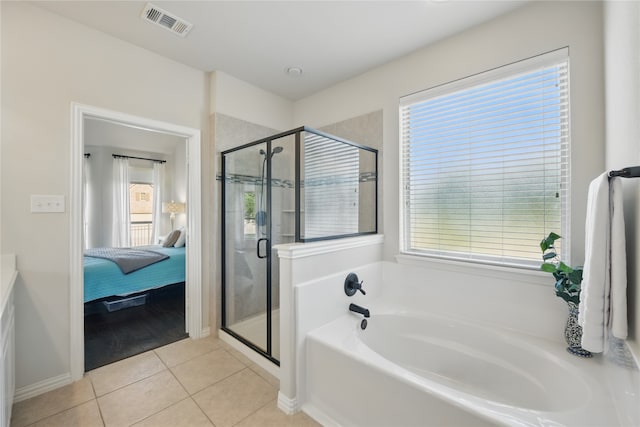 400 Sterling Rdg, Lantana, TX 76226 - bathroom with a garden tub, tile patterned floors, ensuite bathroom, visible vents, and a shower stall