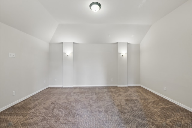 400 Sterling Rdg, Lantana, TX 76226 - unfurnished room with vaulted ceiling, carpet, and baseboards