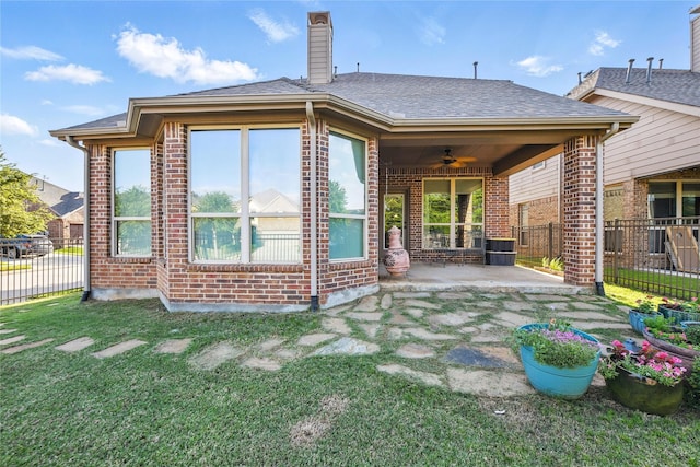 400 Sterling Rdg, Lantana, TX 76226 - back of house with brick siding, fence, and ceiling fan