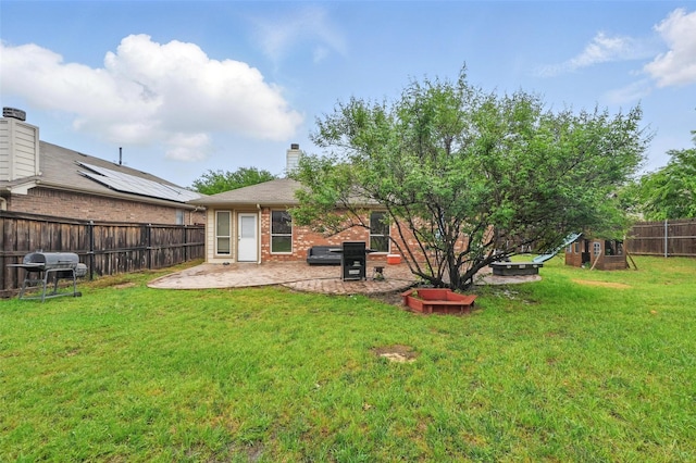 view of yard with a patio and a fenced backyard