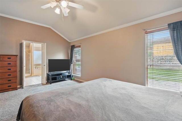 bedroom with crown molding, carpet, vaulted ceiling, and multiple windows