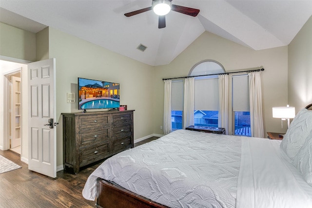 bedroom with a ceiling fan, visible vents, vaulted ceiling, baseboards, and dark wood-style floors