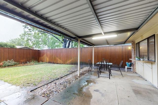1907 Rambling Ridge Ln, Carrollton, TX 75007 - view of patio with outdoor dining area and a fenced backyard