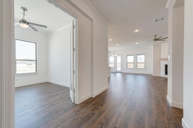 interior space with recessed lighting, baseboards, visible vents, and dark wood finished floors