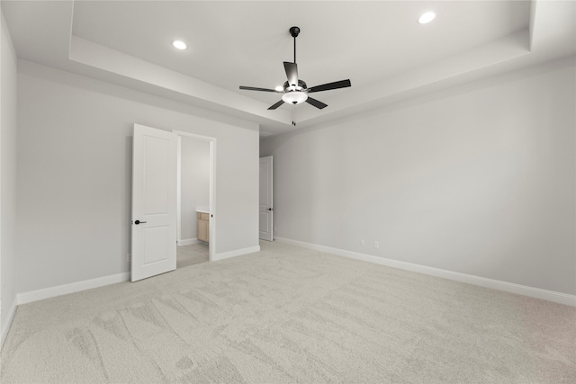 2206 Stratford Rd, Rockwall, TX 75087 - unfurnished bedroom with a raised ceiling, light carpet, recessed lighting, baseboards, and ceiling fan