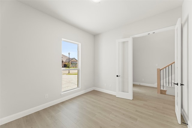 2206 Stratford Rd, Rockwall, TX 75087 - spare room with light wood-style flooring and baseboards