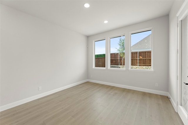 2206 Stratford Rd, Rockwall, TX 75087 - empty room with light wood-style floors, baseboards, and recessed lighting