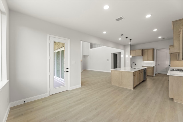 2206 Stratford Rd, Rockwall, TX 75087 - kitchen featuring a sink, recessed lighting, light countertops, light wood-style floors, and gas stovetop
