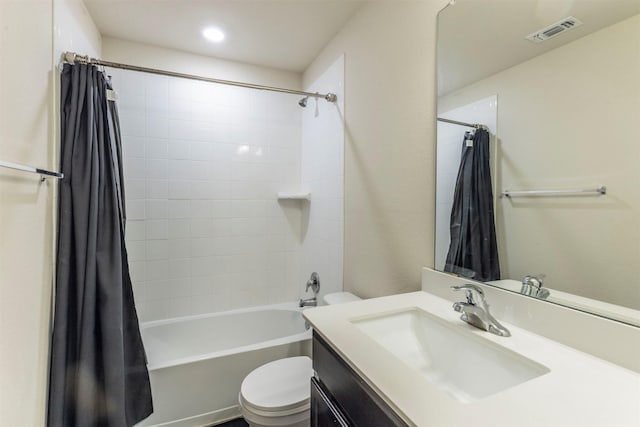 bathroom with visible vents, vanity, toilet, shower / tub combo with curtain, and recessed lighting