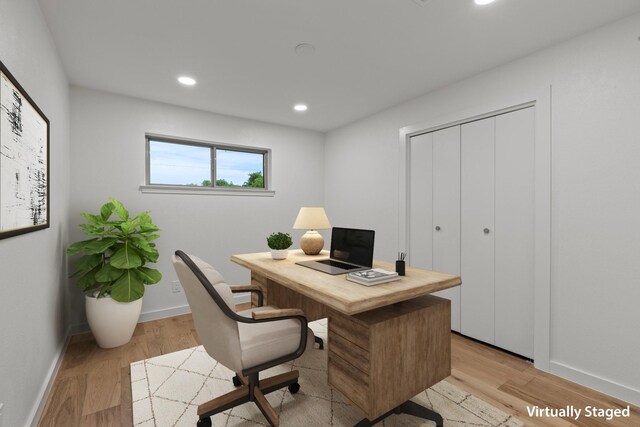 office with baseboards, light wood-style flooring, and recessed lighting