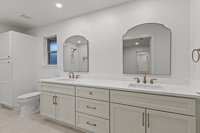 full bathroom with toilet, a shower, double vanity, and recessed lighting