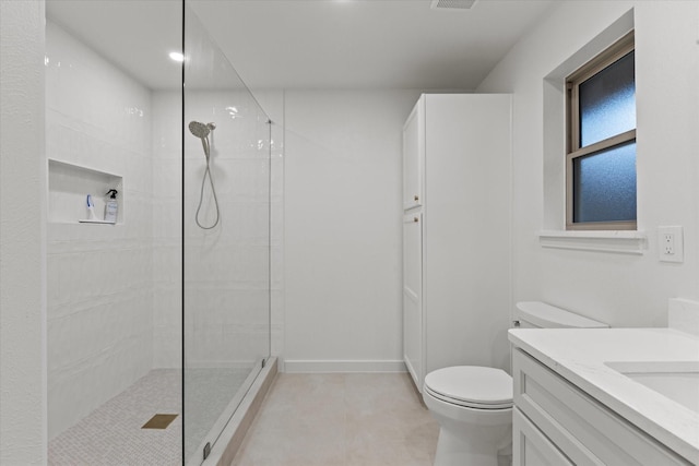 1717 Anderson St, Irving, TX 75062 - bathroom with walk in shower, toilet, vanity, and baseboards