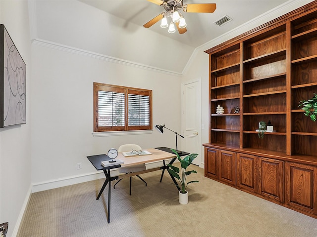 home office with visible vents, ceiling fan, lofted ceiling, and light colored carpet