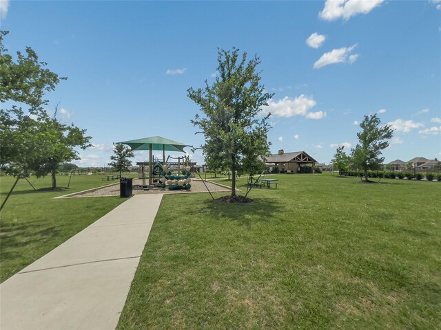 1151 Rumble Ln, Fate, TX 75087 - view of community featuring a yard and a playground