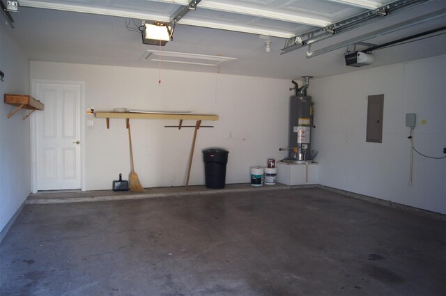garage featuring a garage door opener, gas water heater, and electric panel