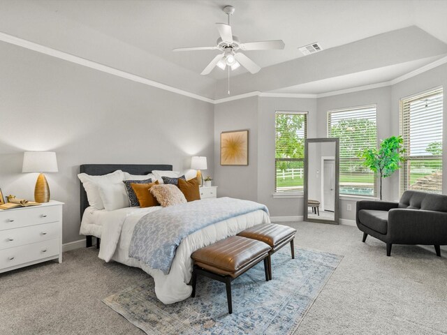 bedroom with ceiling fan, visible vents, baseboards, ornamental molding, and light carpet