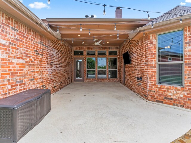 view of patio / terrace featuring a ceiling fan