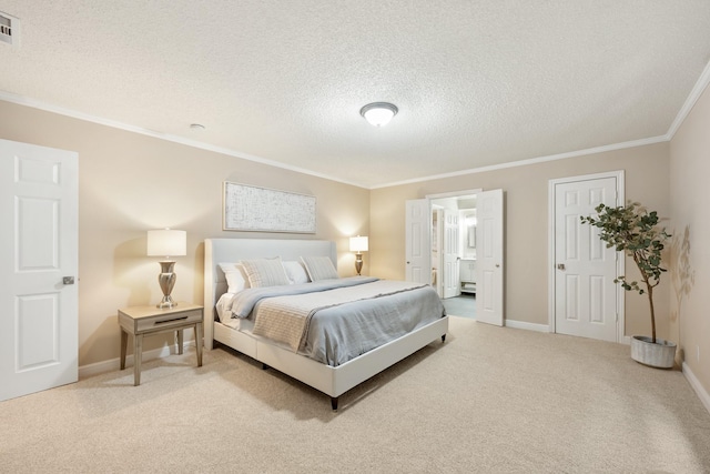 bedroom featuring ornamental molding, carpet, and a textured ceiling