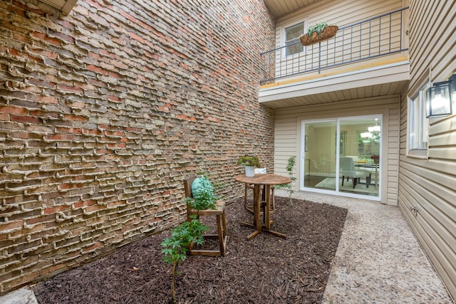 view of home's exterior featuring a balcony