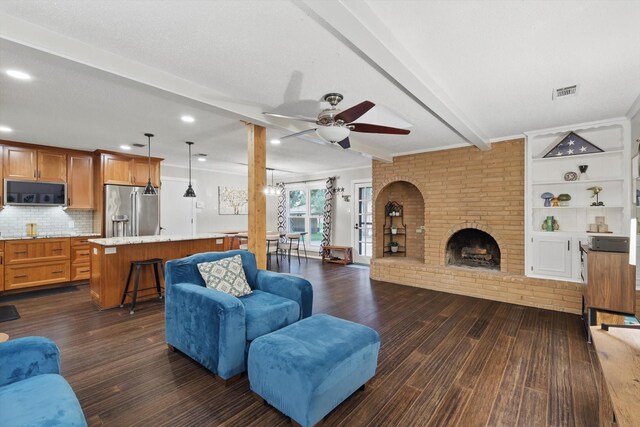 living area featuring beam ceiling, a ceiling fan, recessed lighting, dark wood-type flooring, and visible vents