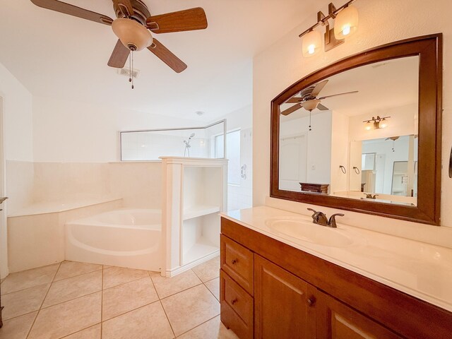 full bathroom featuring a walk in shower, tile patterned flooring, vanity, a ceiling fan, and a garden tub