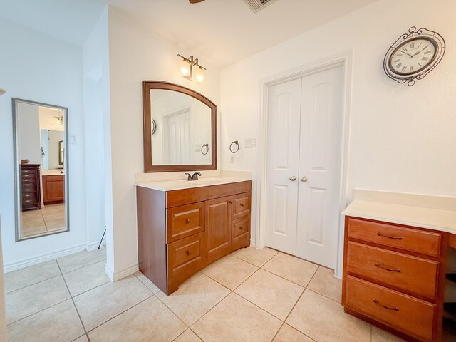 bathroom featuring tile patterned floors and vanity