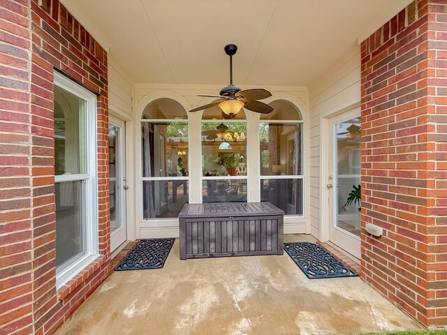 view of patio featuring a ceiling fan