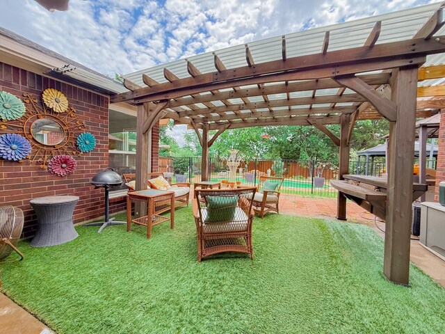 exterior space featuring a fenced backyard, a pergola, an outdoor hangout area, and a patio