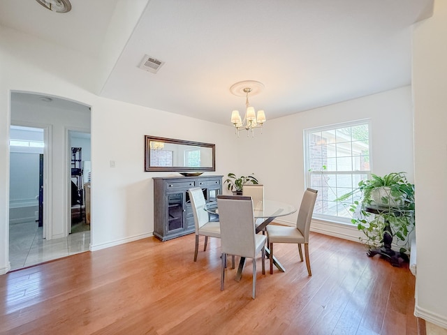200 Meadowside Dr, Mansfield, TX 76063 - entryway with a chandelier, baseboards, and light wood-type flooring