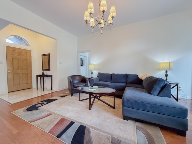 200 Meadowside Dr, Mansfield, TX 76063 - living area with light wood-style floors, a chandelier, and baseboards