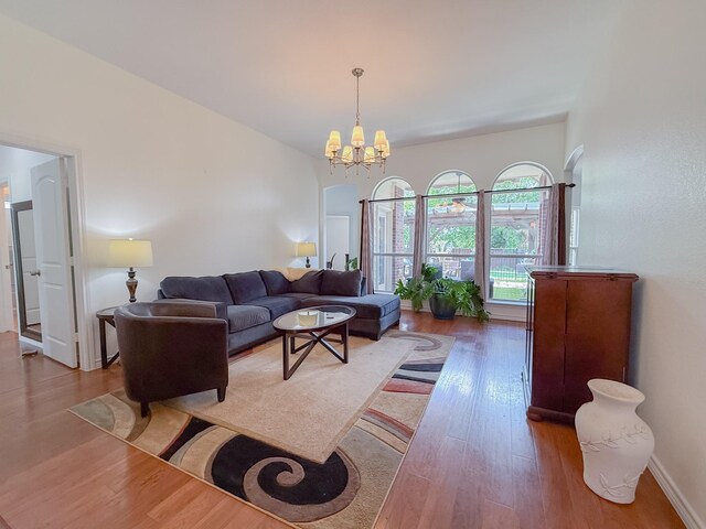 200 Meadowside Dr, Mansfield, TX 76063 - living area featuring a chandelier and light wood-style floors