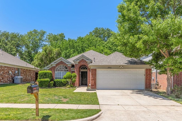 ranch-style house with a front lawn, brick siding, a shingled roof, concrete driveway, and an attached garage