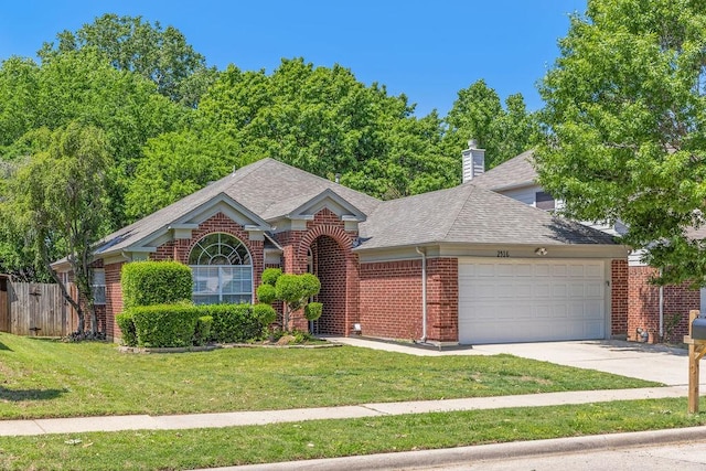 ranch-style home featuring brick siding, an attached garage, roof with shingles, and fence