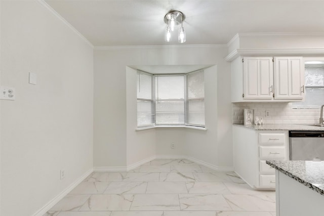 913 Vince Ln, Desoto, TX 75115 - unfurnished dining area with baseboards, plenty of natural light, a sink, and marble finish floor