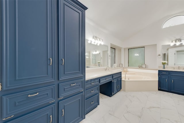 913 Vince Ln, Desoto, TX 75115 - bathroom with a garden tub, a sink, lofted ceiling, and two vanities
