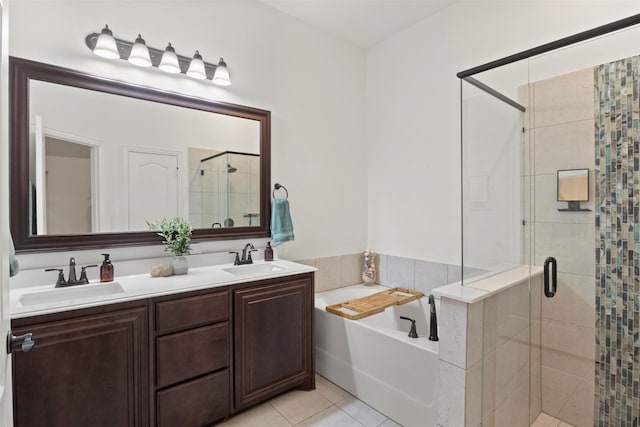 1248 Starlight Ave, Aubrey, TX 76227 - full bath featuring a garden tub, a shower stall, double vanity, and tile patterned flooring