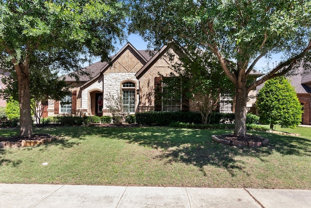 2206 Glasgow Dr, Trophy Club, TX 76262 - french country home featuring stone siding and a front yard