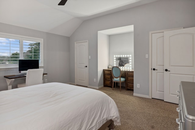 2206 Glasgow Dr, Trophy Club, TX 76262 - carpeted bedroom with lofted ceiling, a desk, ceiling fan, and baseboards