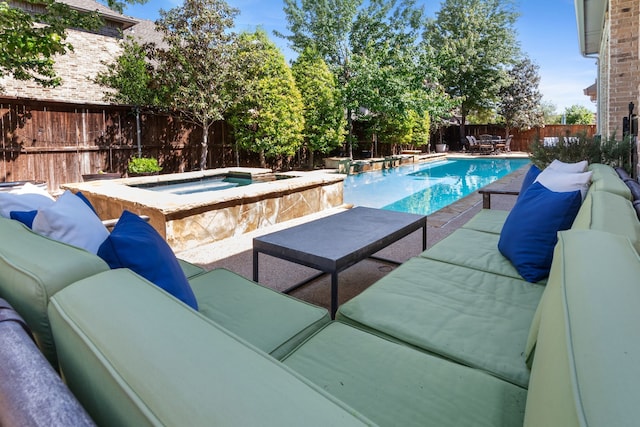 2206 Glasgow Dr, Trophy Club, TX 76262 - view of swimming pool featuring an outdoor living space, a fenced backyard, a pool with connected hot tub, and a patio