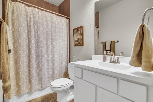 3213 Timberline Dr, Melissa, TX 75454 - full bathroom featuring vanity, a textured wall, toilet, and shower / tub combo with curtain