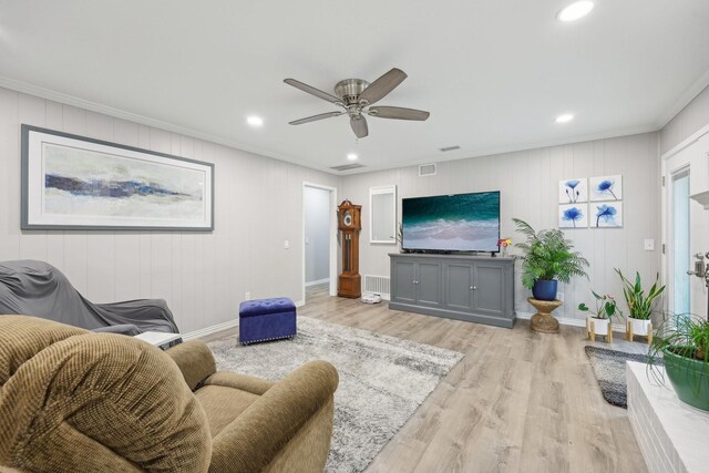 living room with recessed lighting, baseboards, a ceiling fan, and light wood finished floors