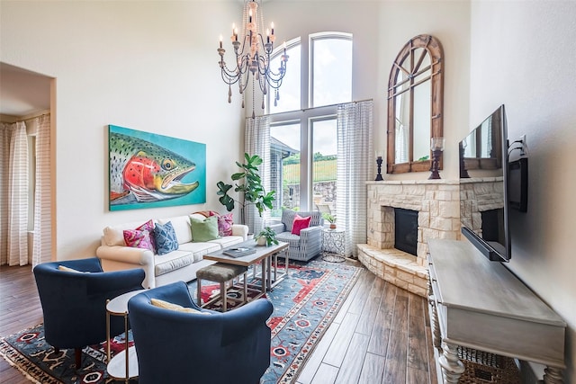 13845 Marys Ridge Rd, Fort Worth, TX 76008 - living area with an inviting chandelier, wood-type flooring, a high ceiling, and a fireplace